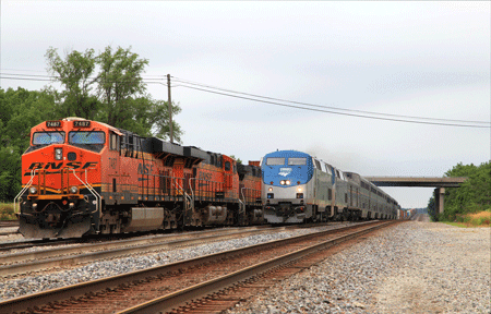 SW Chief passes parked train