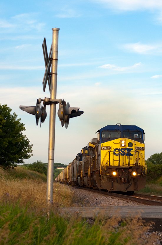 Leading a locomotive trio featuring the YN2 paint scheme, CSX C40-8W No. 7834 rolls west on the Adams line in Merton, Wis. Canon EOS 30D, July 13, 2011, 1/800 sec, f/6.3, ISO 320, 84mm. Drew Halverson photo